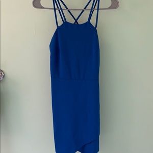 Blue body con dress with cross back